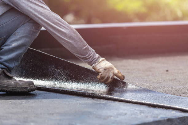 Professional Basement Waterproofing technician working in Elwood, IN